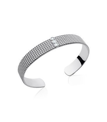 Beau bracelet argent massif rigide plat volutes ouvragées Beau bracelet argent massif rigide plat volutes ouvragées